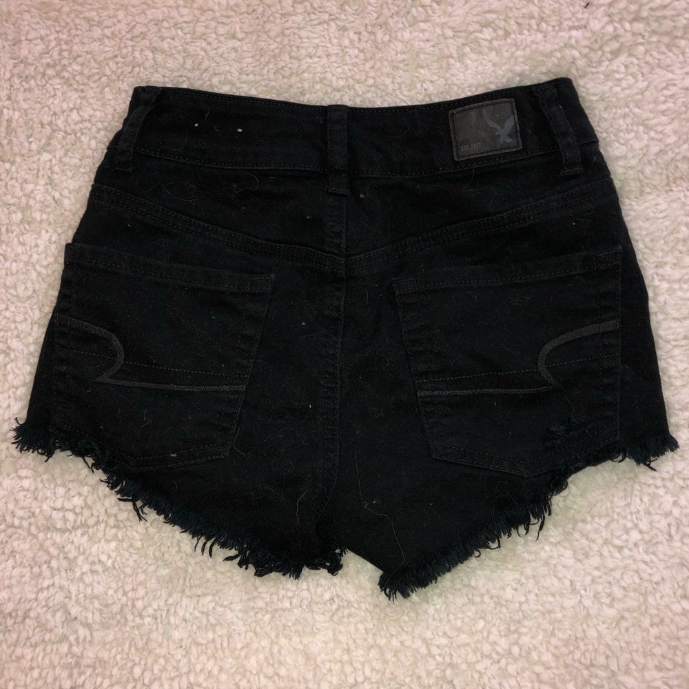 American Eagle distressed black shorts.